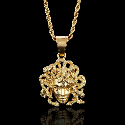 Gold Medusa pendant with gorgon head and serpent details